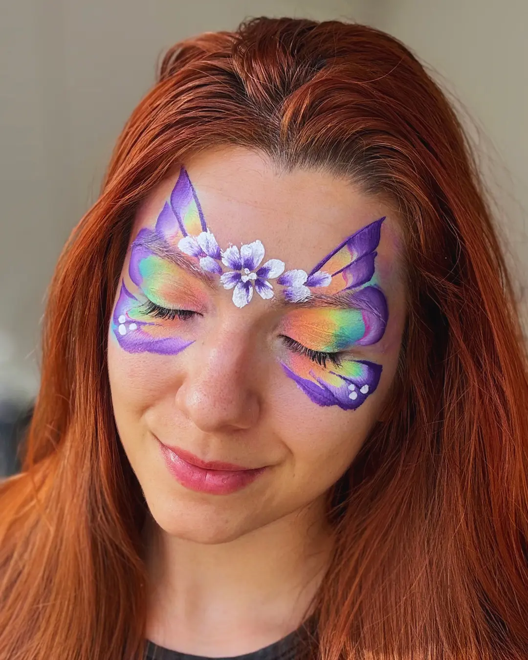 Pintura facial avançada de borboleta floral